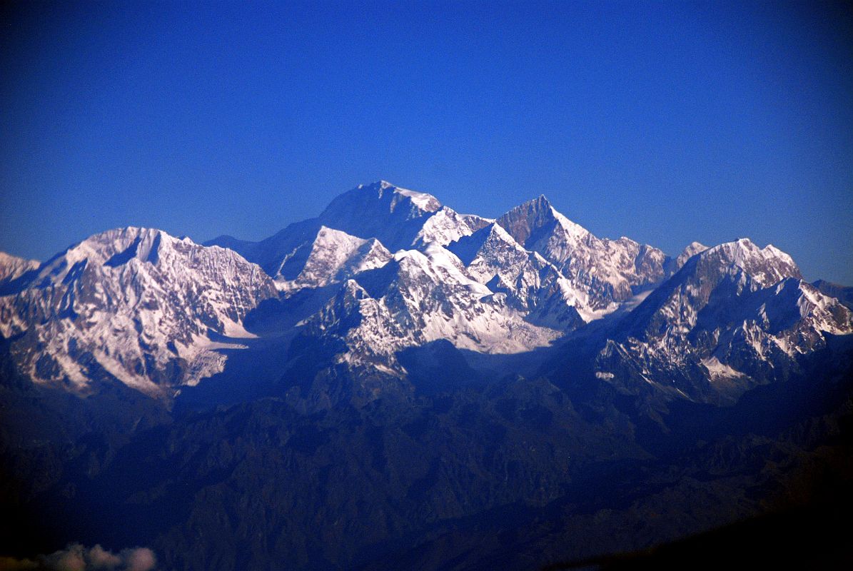 Kathmandu Mountain Flight 03-1 Shishapangma With Dorje Lakpa To Left The Kathmandu Mountain Flight approaches Shishapangma, the 14th highest mountain in the world. On the left is Dorje Lakpa (6696m). The pointy peak to the right of Shishapangma is Phola Gangchen (7716m).